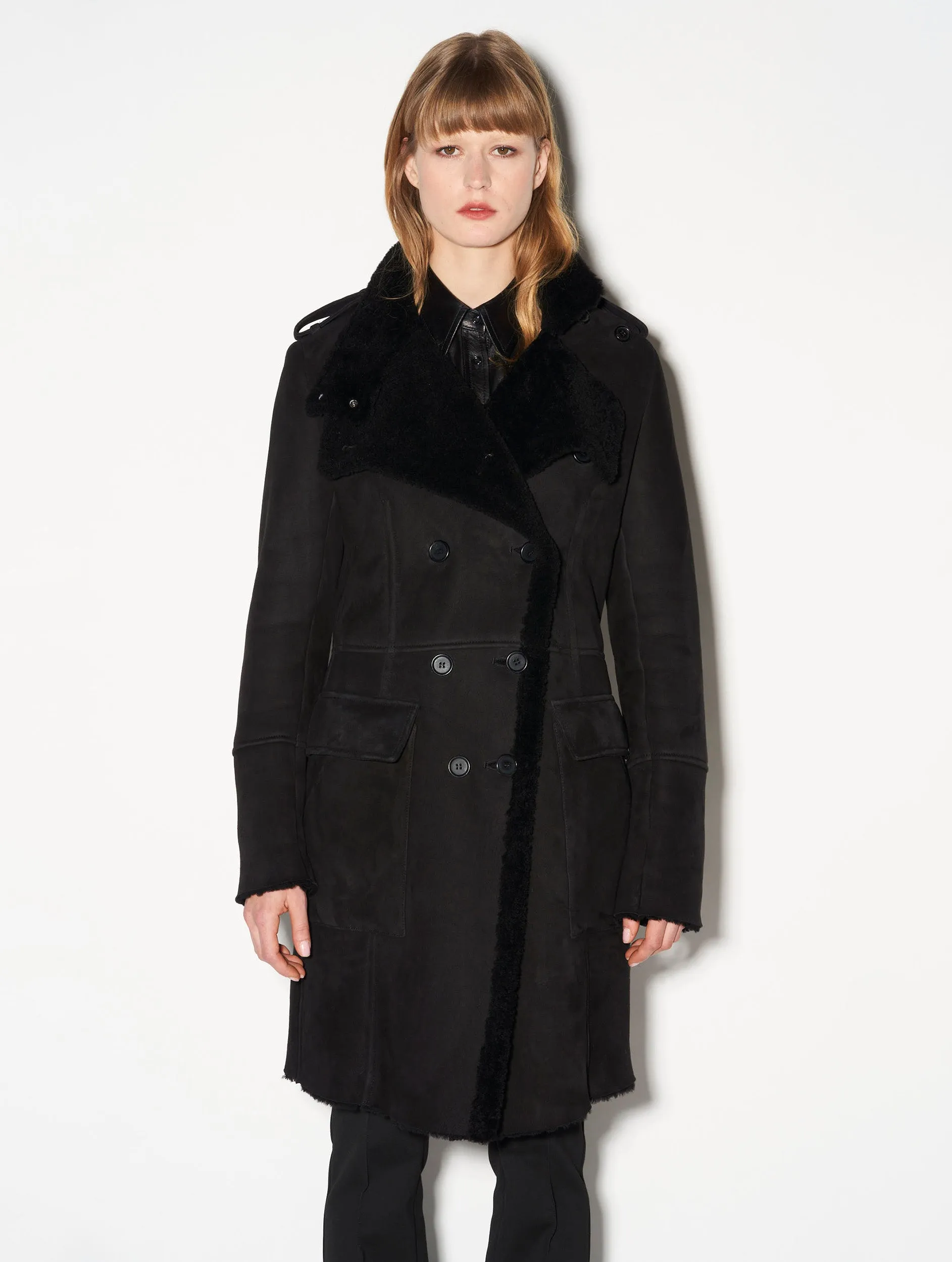 Black double-breasted shearling coat